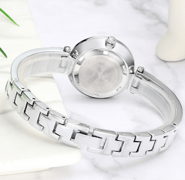 Womens Elegant Stainless Steel Watch With Ceramic Bracelet In Shimmering Marble Colors