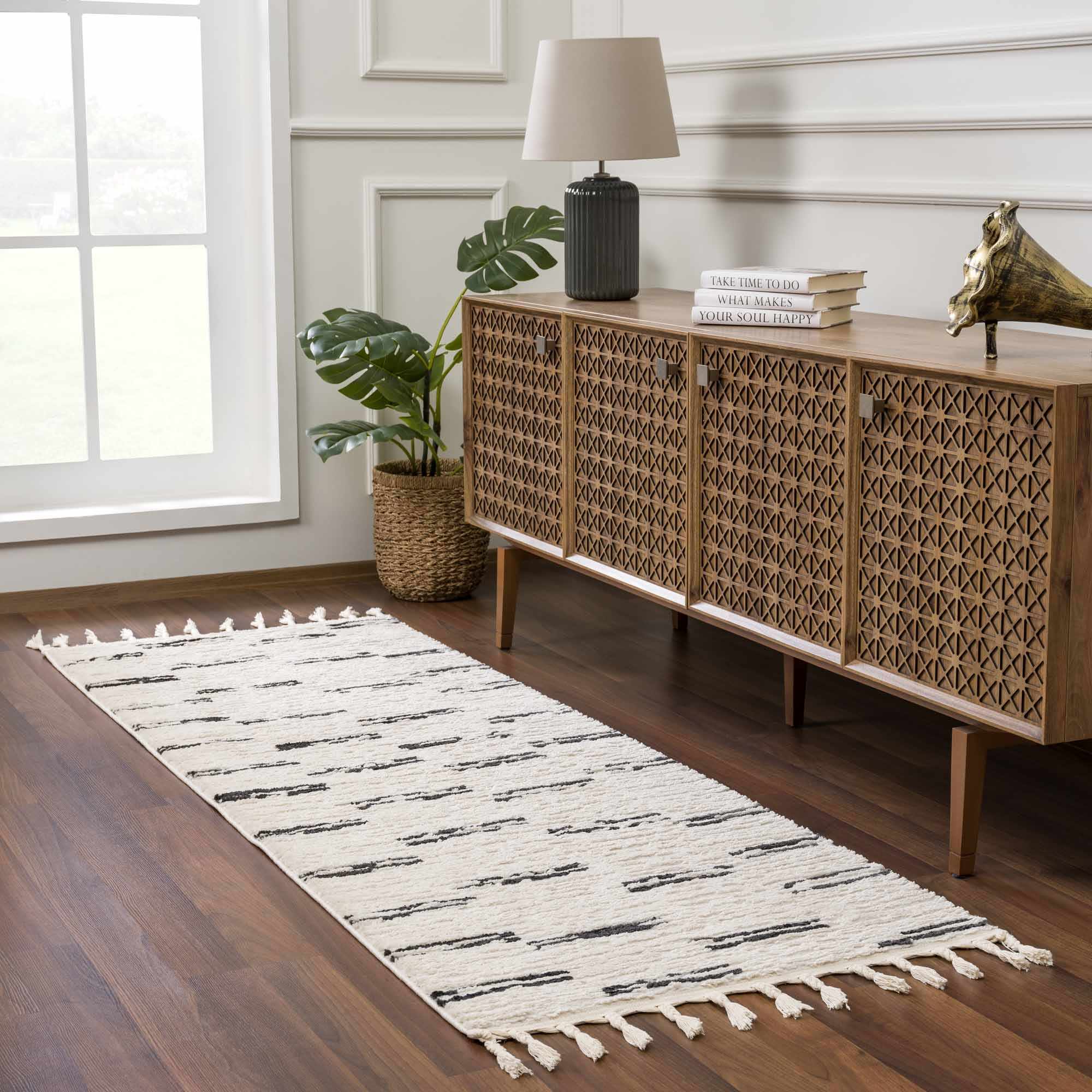 Riad Black Striped White Rug with Tassels