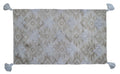 Tufted accent rug with corner tussels (25"x45")