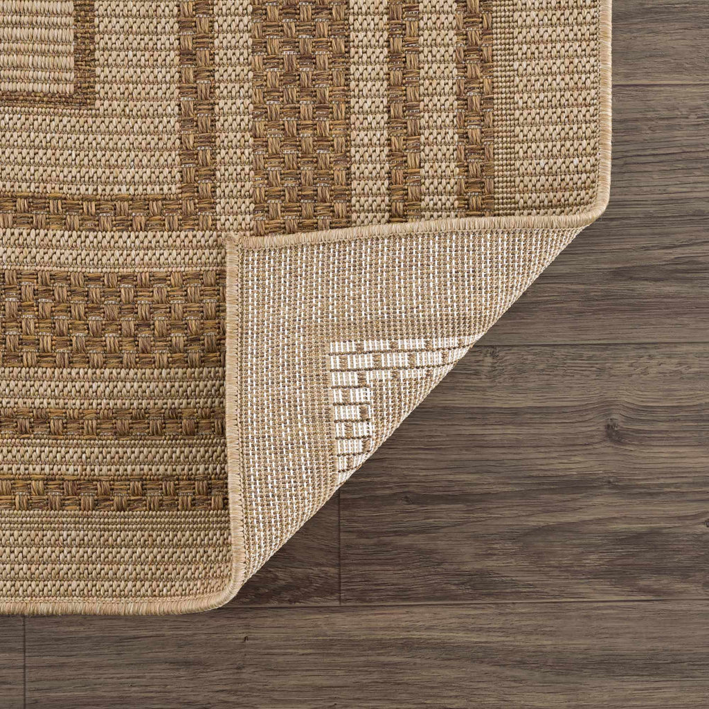 Isoko Bordered Faux Jute Outdoor Rug