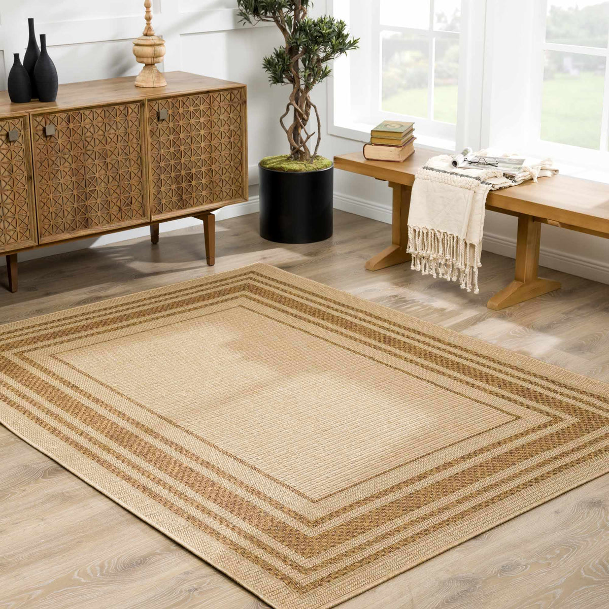 Isoko Bordered Faux Jute Outdoor Rug