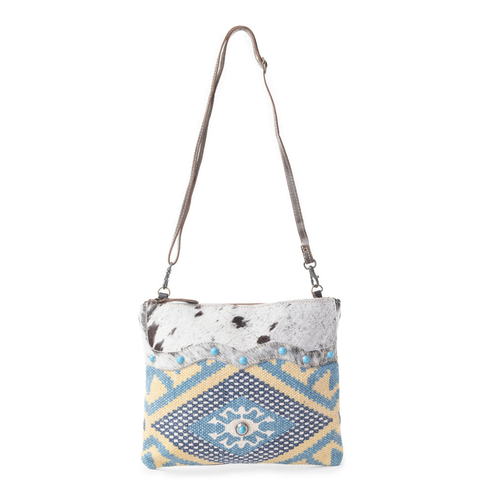 Myra Tufts Pattern Woven Hairon Crossbody â€“ Tribal Geometric Print with Leather Strap and Studded Accents