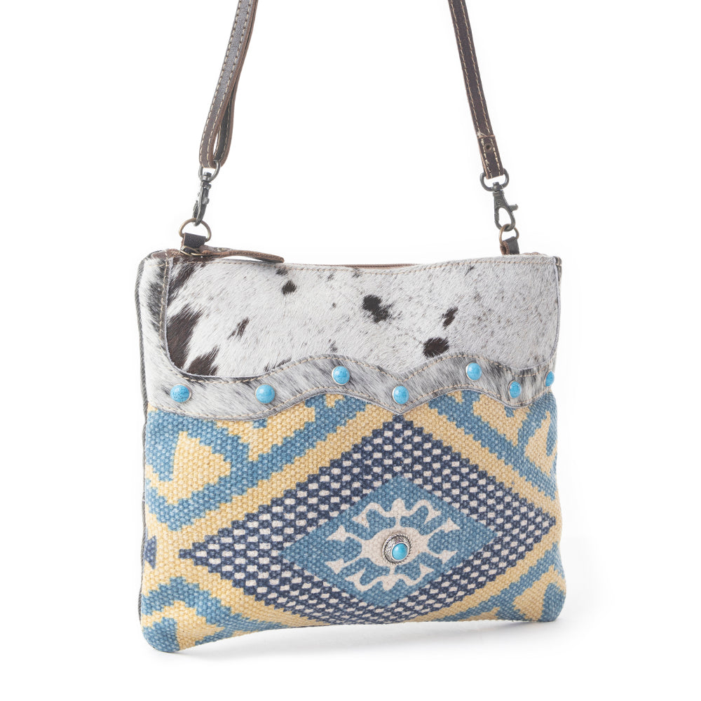 Myra Tufts Pattern Woven Hairon Crossbody â€“ Tribal Geometric Print with Leather Strap and Studded Accents