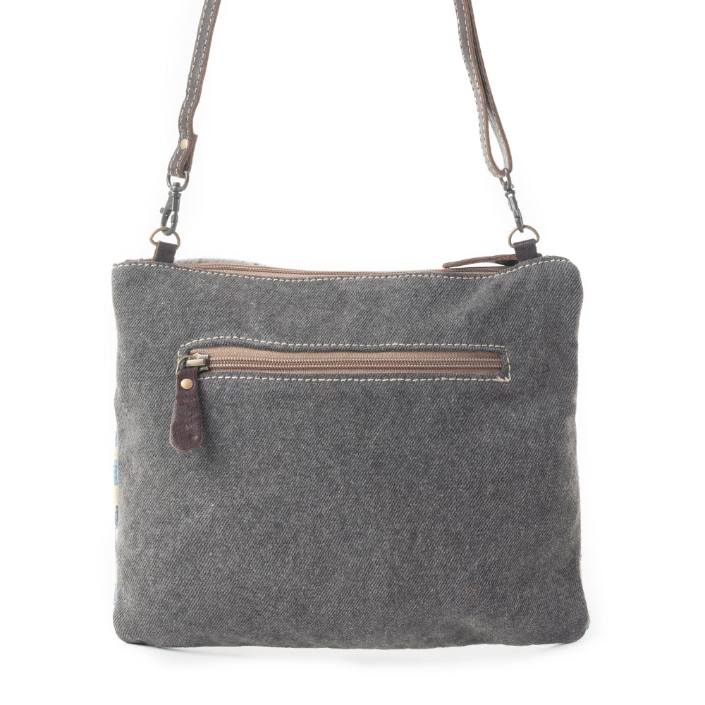 Myra Tufts Pattern Woven Hairon Crossbody â€“ Tribal Geometric Print with Leather Strap and Studded Accents