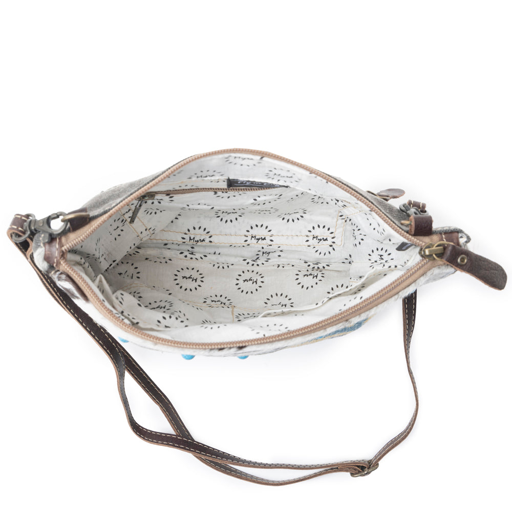 Myra Tufts Pattern Woven Hairon Crossbody â€“ Tribal Geometric Print with Leather Strap and Studded Accents