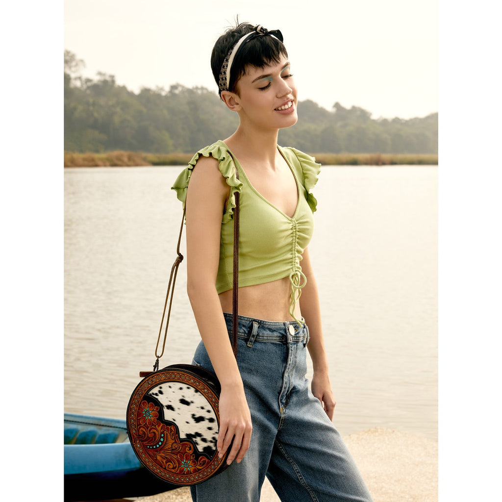 Myra Simply Sober Round Hairon Leather Crossbody â€“ Handtooled Floral & Cowhide Circle Bag for Carnival Adventures