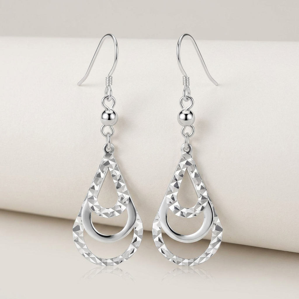 Sterling Silver Textured Graduated Open Teardrop Dangling Style Earrings