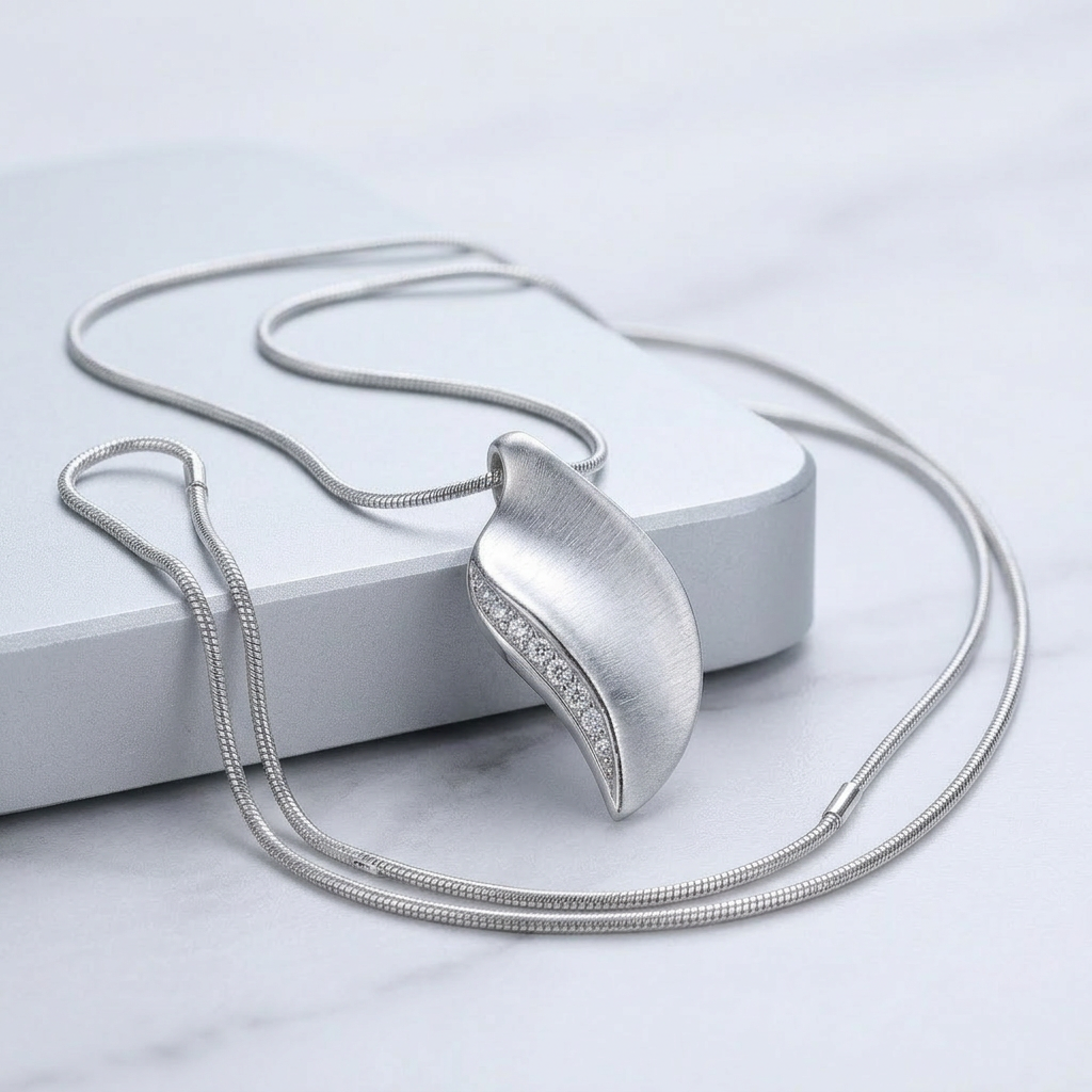 Avera Crystal Leaf Necklace in Polished Silver