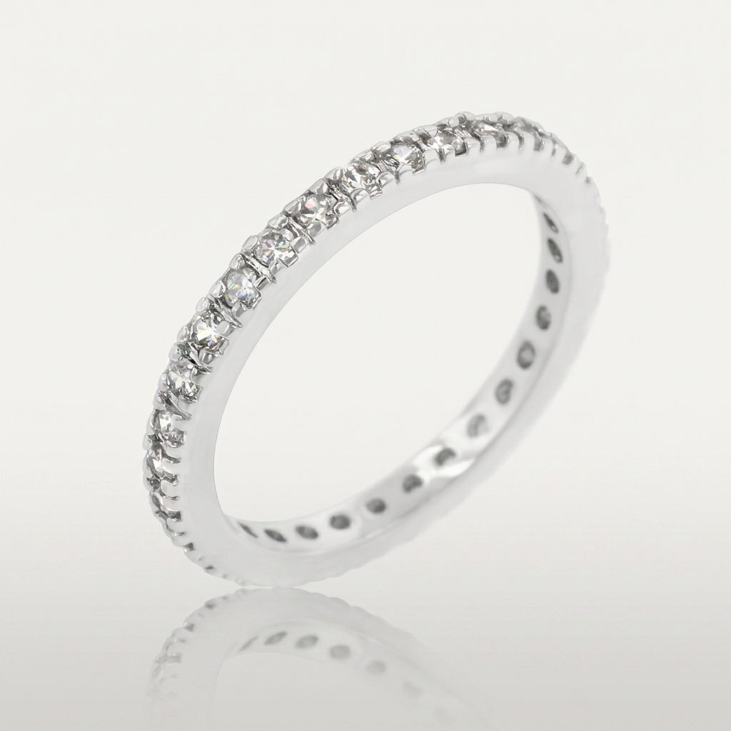 Avera Delicate Cubic Zirconia Eternity Band in Silver Tone