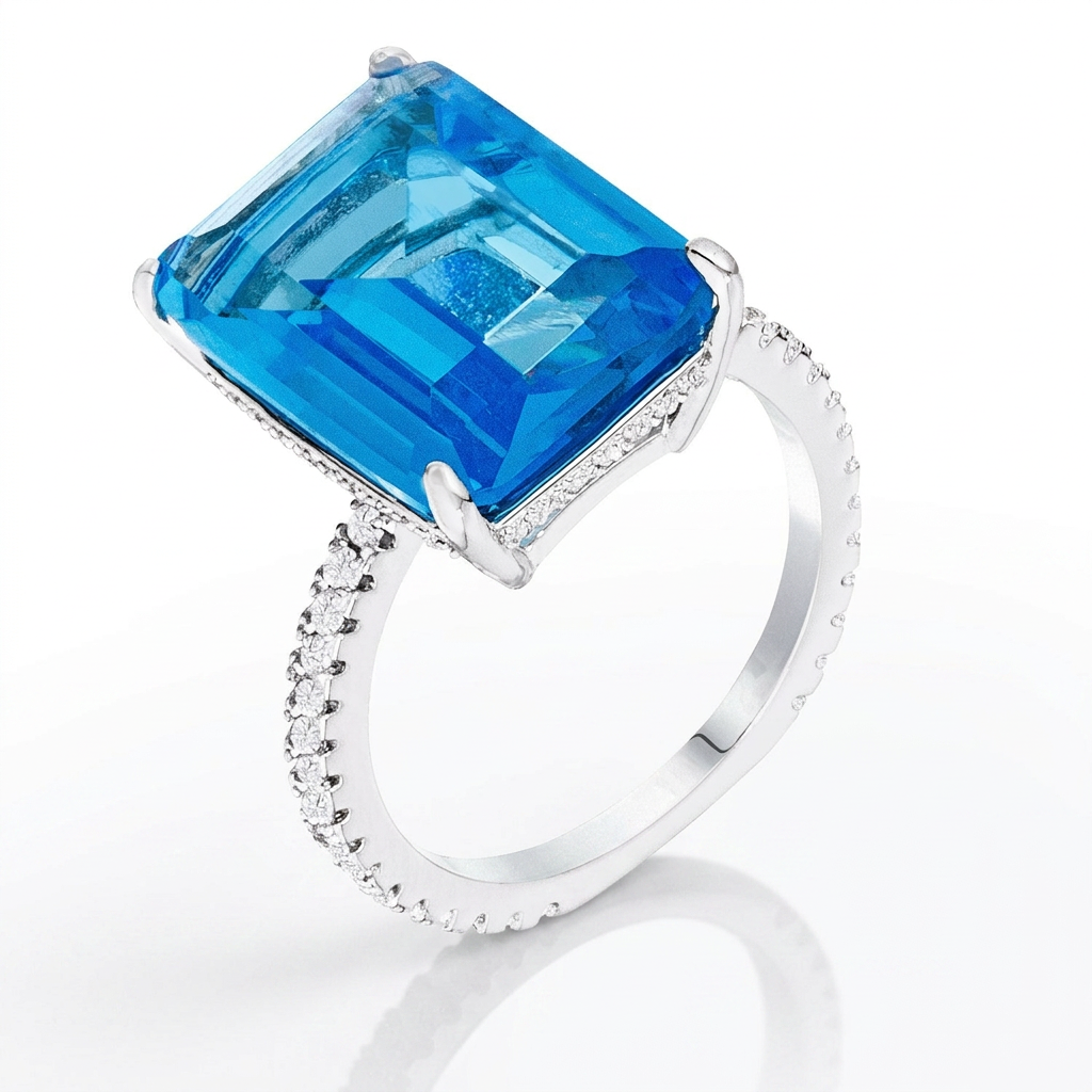 Avera 15Ct Plated Emerald Cut Pave Ring With Blue Stone