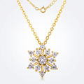 Avera Contemporary Cz Snowflake Necklace In Gold Tone