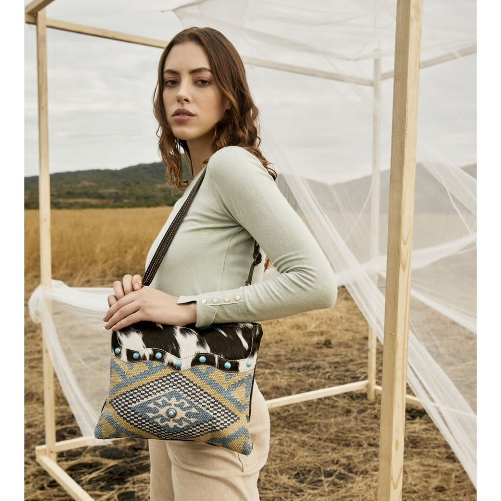 Myra Tufts Pattern Woven Hairon Crossbody â€“ Tribal Geometric Print with Leather Strap and Studded Accents